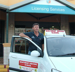 Joe in front of the Winthrop licensing center